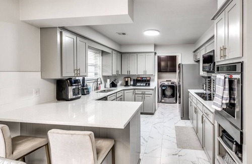 Oklahoma City House | Modern Urban Retreat With Hot Tub. Close to major popular restaurants.