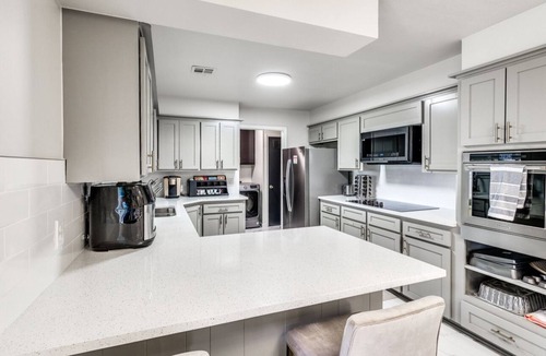 Oklahoma City House | Modern Urban Retreat With Hot Tub. Close to major popular restaurants.