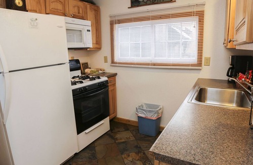 Estes Park Cabin | Mountain Decor in this Two Bedroom Cabin with a beautiful mountain view from deck. Dog friendly