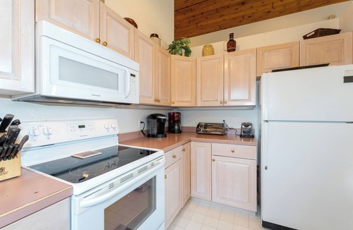 Bigfork Condo | New! Home on Golf Course, Fireplace, Spacious Deck