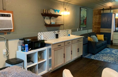 Grove Resort | New modern cabin on a beautiful shaded property across from Honey Creek Bridge.