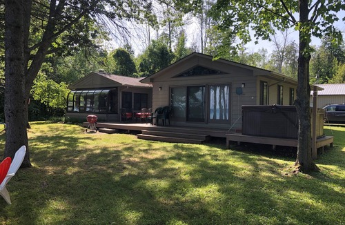 Brutus Cottage | Peaceful setting on northwest shore of Burt Lake - sleeps 12