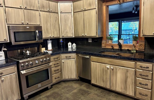 Yates Center Cottage | Pet & Family Friendly Cottage w/Nature Views in Yates Center - Fire Pit & Grill