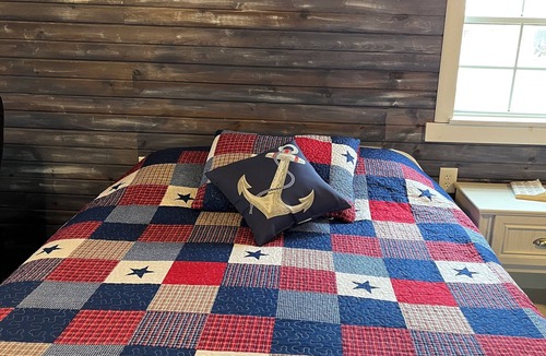 Russell County Cabin | Pet friendly cabin w/ bathroom, WiFi and Heat/AC in ART town Lucas. Lake nearby.