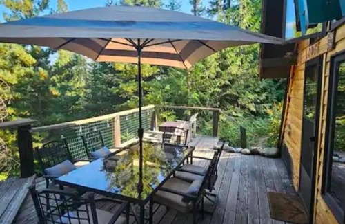 Sandpoint Ski Chalet | Pet friendly off grid chalet tucked away on a mountainside .