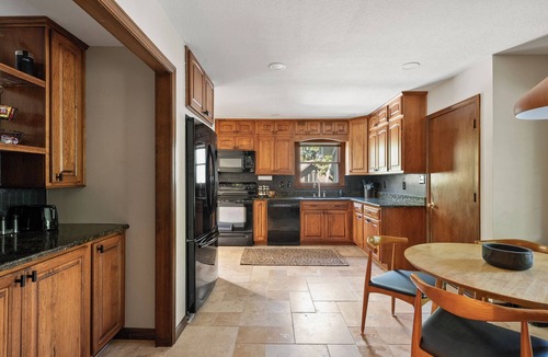 Merriam House | Pool & Hot Tub in the heart of KC! Tons of stylish space inside and out!