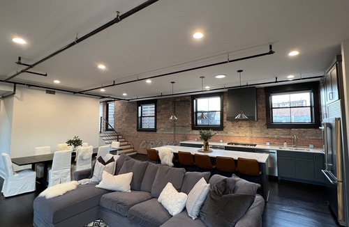 Downtown Lincoln Condo | Premier penthouse w Private Rooftop near Memorial Stadium & Pinnacle Arena!