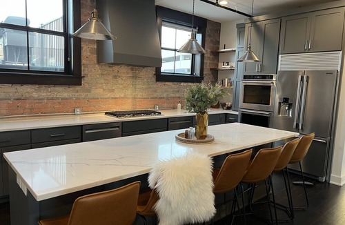 Downtown Lincoln Condo | Premier penthouse w Private Rooftop near Memorial Stadium & Pinnacle Arena!