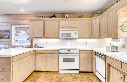 South Fork Cabin | Relaxing riverfront cabin w/river & mountain view, wraparound deck, and firepit