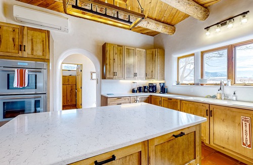 Arroyo Seco House | Renovated mountain-view villa with private hot tub, roof deck, & enclosed yard
