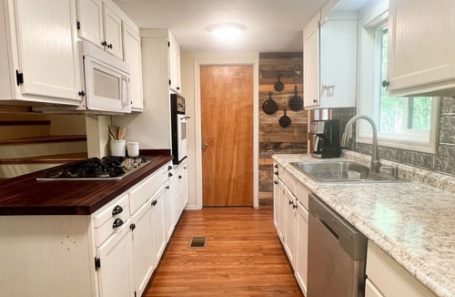 Whispering Pines Cabin | Riverside Hideaway: A Private Forest Retreat with Riverfront Elegance