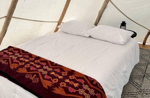 Fort Washakie House | Serenity Meets Style: Original Tipi Glamping in Fort Washakie, WY