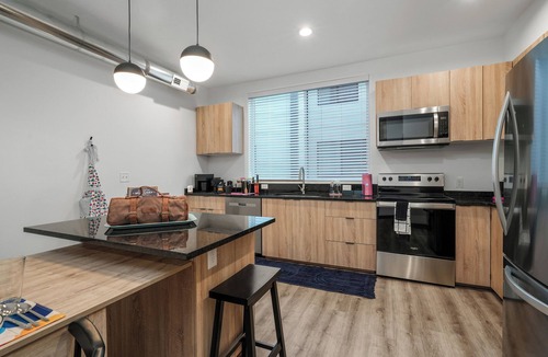 People's Freeway House | SLC Ski Hub Near Downtown with Private Rooftop + Garage