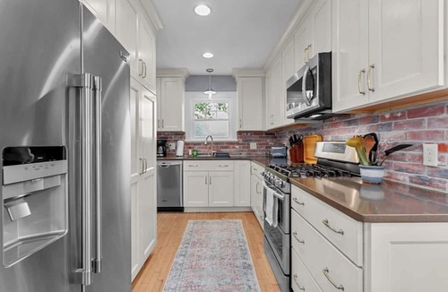 Ward Parkway House | Spacious 4 Bed Home with Backyard Oasis 52