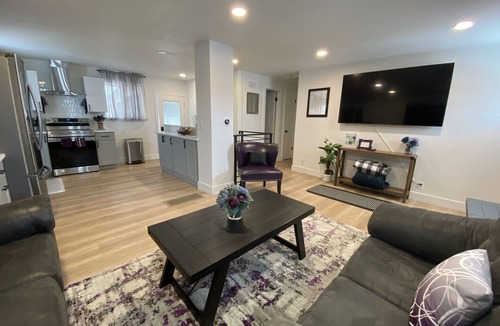 Dupont House | Spacious 4BR Denver Home: 4 King Beds, Pet Friendly, Arcade & Backyard
