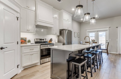 Wheatland House | Spacious 4BR Furnished Yukon Home | Patio + Garage