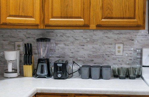 Grand Island House | Spacious 6-bedroom house in Grand Island. Centrally located home.