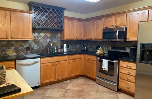 Lawrence House | Spacious and Serene 4-bedroom townhome in charming Lawrence