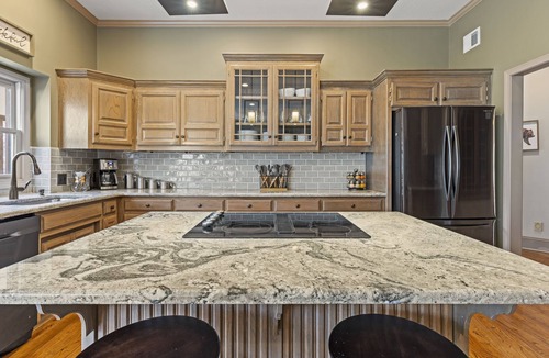 Bucyrus House | Spacious KC Creekside Lodge Retreat with Fire Pit and Views