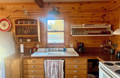 Hartington Cabin | Stay in a Stunning Red Barn Filled with Antique Charm