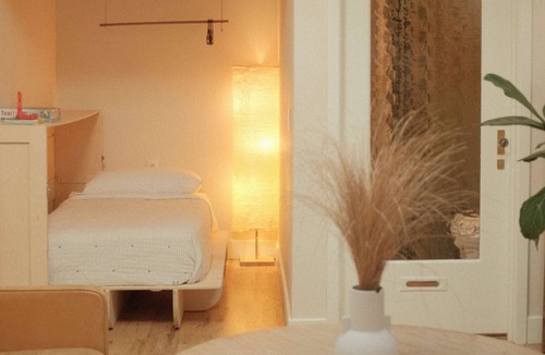 Crossroads Arts District Hotel | Studio One · The Terracotta Sunset Suite