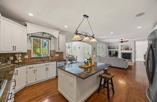 Overland Park House | Stunning private villa pond, theater