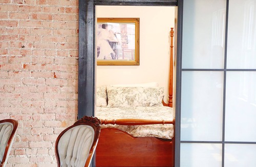 Bartlesville Apartment | Swanky downtown Loft fit for a king! History and Luxury for a perfect getaway