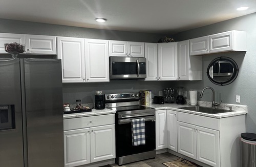 Aurora House | The room has bathroom and king size bed and a shared living room. Super cozy!