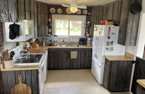 Saratoga House | Treasure Island Homestead - Rustic Charm Meets Riverfront Serenity
