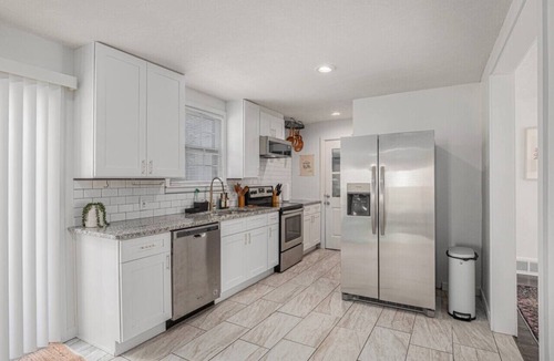 Prairie Village House | Tropical Hideaway: Hot Tub, Pool, Remodeled in Prairie Village
