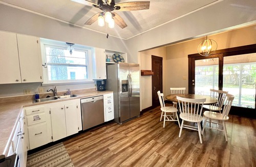Salina House | Walk downtown, Charming 3 BR -2 King beds, Porch, Fire Pit, Theatre, Fenced Yard