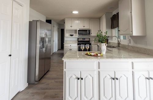 Manhattan House | Walk to KSU Stadium! Swim Spa, Putting Green, Gym, Fire Pit!