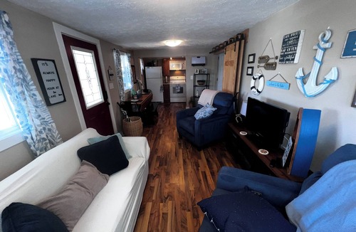 Norway Cottage | Waterfront 2BR Cottage: Fire Pit, Grill & Dock -Boat Slip Available additional