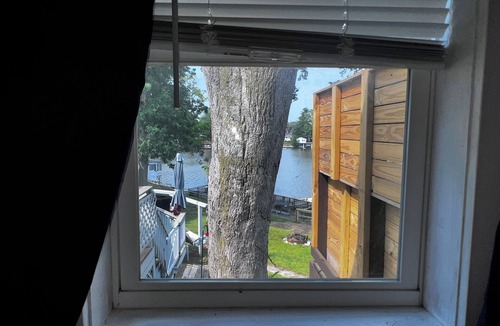 Norway Cottage | Waterfront 2BR Cottage: Fire Pit, Grill & Dock -Boat Slip Available additional