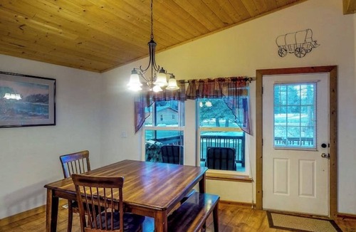 South Fork Cabin | Waterfront cabin with private hot tub, furnished deck, wood stove, & free WiFi