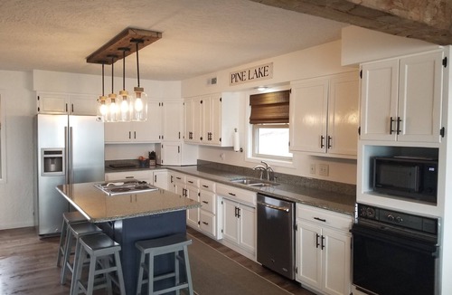 Plainwell House | Waterfront, Private Dock, Pizza Oven + Outdoor Fireplace + Sunset Views