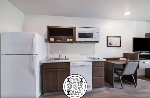 Plano Hotel | WoodSpring Suites Dallas Plano Central Legacy Drive