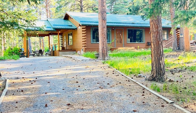 Cabin on the Creek, with fireplace, game room, fenced-in yard and firepit.