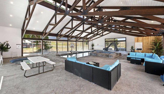 Cedar Farmhouse with Pool (Sleeps 20) by Bear Lake Luxury Rentals