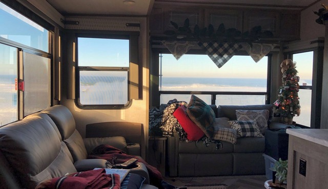 Cozy RV with 2 sleeping areas & WiFi, AC in Cheyenne or your favorite camp site.