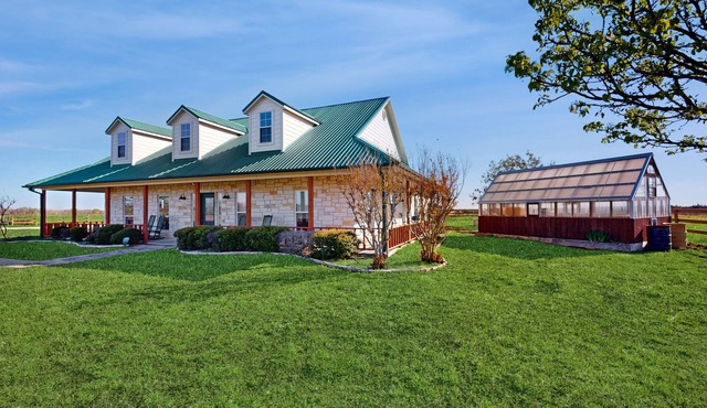 Dog-friendly countryside home with firepit, wraparound porch, & prime stargazing