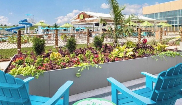 Explore Nearby Legends Outlets and Kansas Speedway from Tropic-Inspired Stay