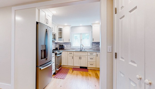 Exquisite updated home near Lake Bomoseen with large backyard, firepit & grill