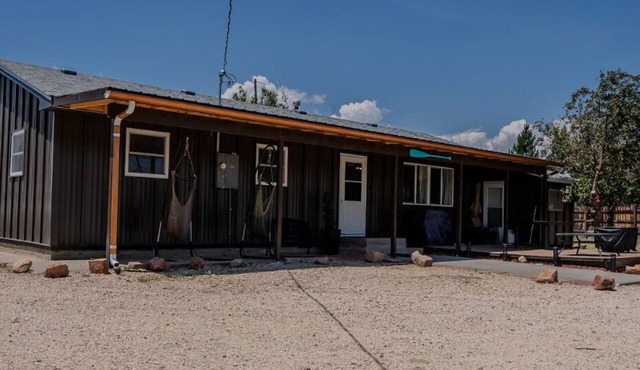 Relax at this riverfront getaway with direct access to fishing, kayaking, and peaceful waterfront views. End your day around the fire pit, grill dinner outdoors, and enjoy a quiet escape surrounded by nature.