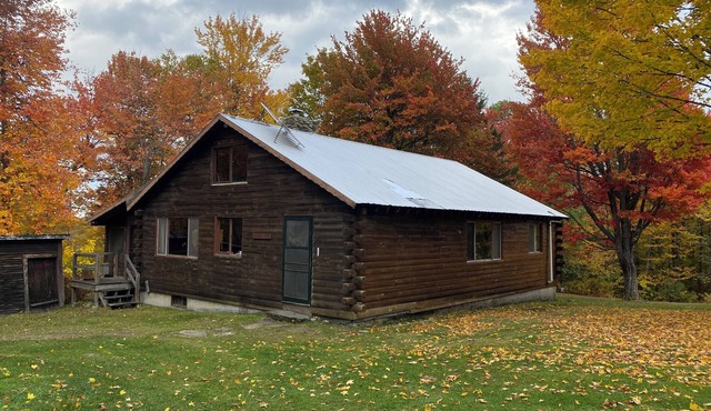 Rustic camping cabin on 360 acres with 2 lakes and trails, sleeps 8