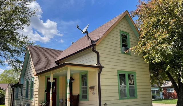 Story and a half home less than a block from Pella's town square.