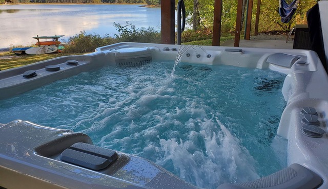 Tranquil Lakefront Log Cabin with Breathtaking Views.
