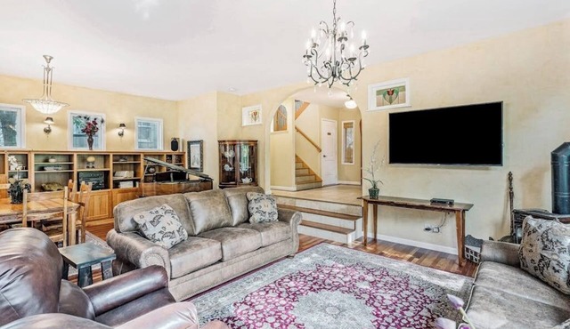 Walkable downtown villa with mountain/resort-view balconies, grills, & fireplace