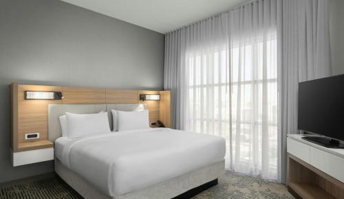 One-Bedroom King Suite with Sofa Bed and Roll-In Shower - Mobility and Hearing Accessible